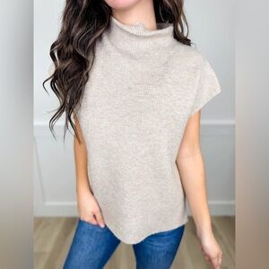 Mock neck sleeveless sweater